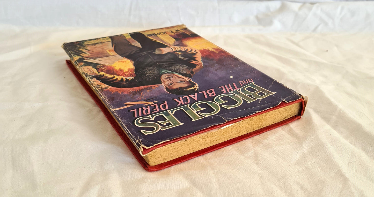 Biggles and the Black Peril by Captain W. E. Johns (half jacket)