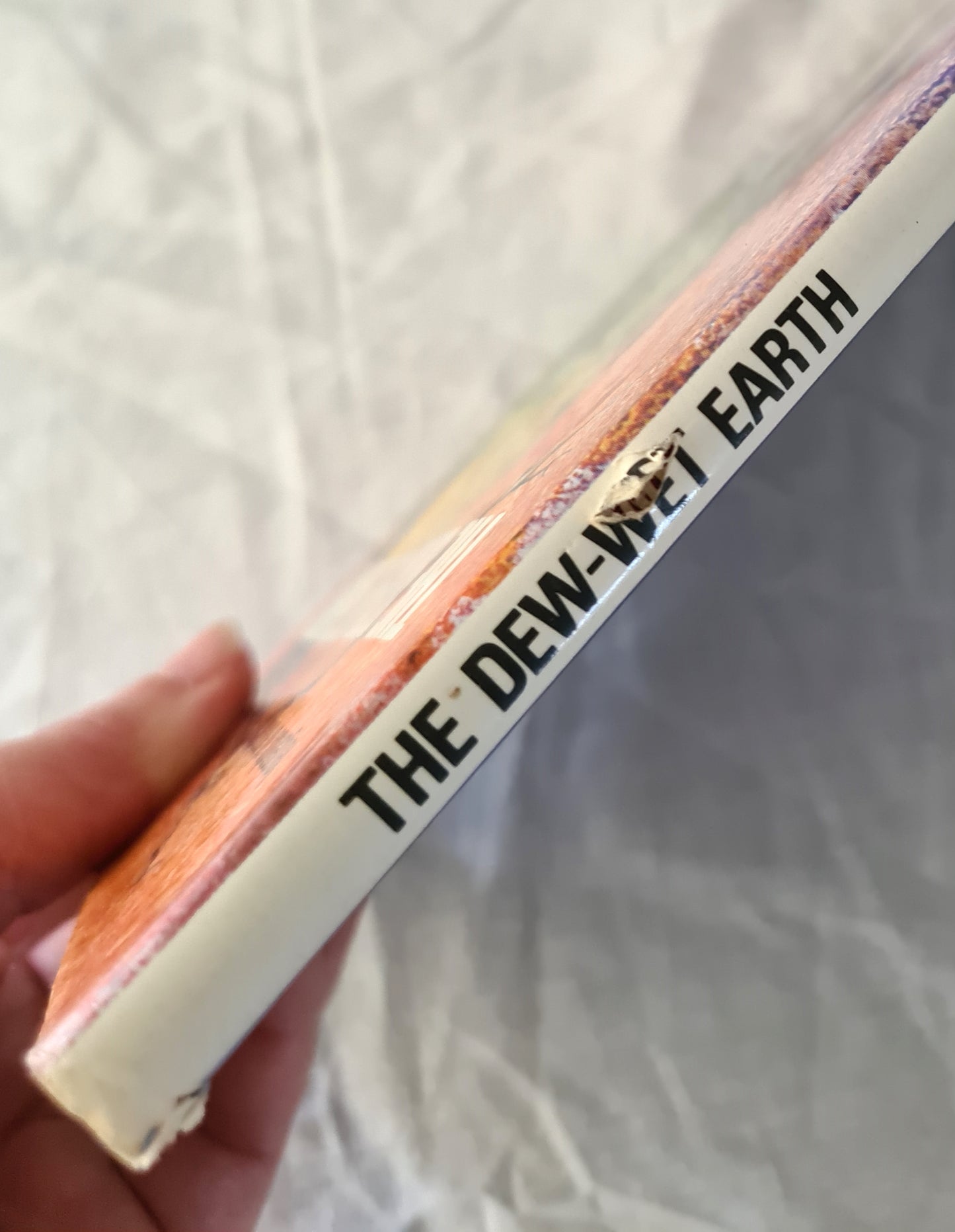 The Dew-Wet Earth by A. E. Wells