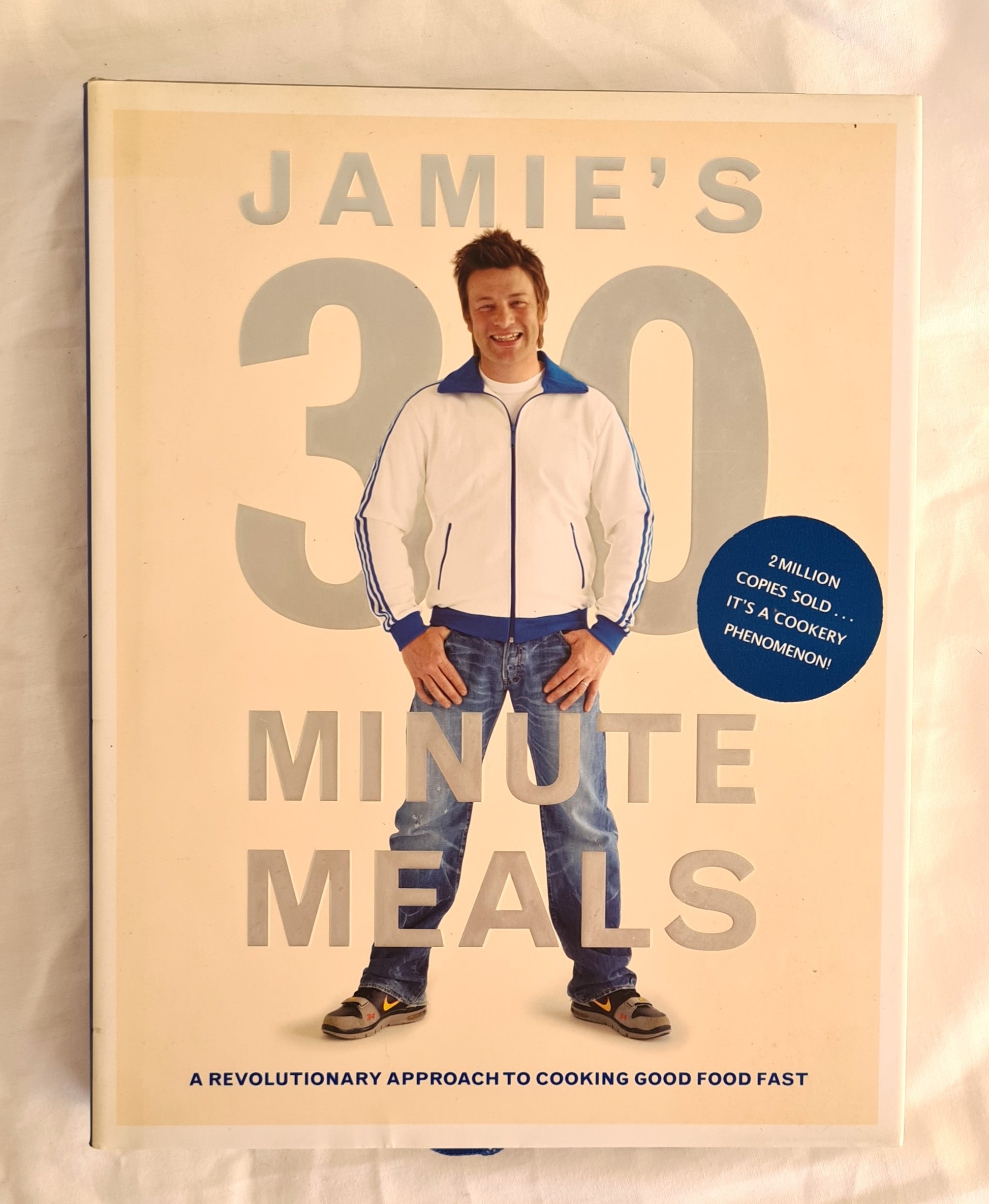 Jamie’s 30 Minute Meals  A Revolutionary Approach to Cooking Food Fast  by Jamie Oliver  Photography by David Loftus