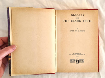 Biggles and the Black Peril by Captain W. E. Johns (half jacket)