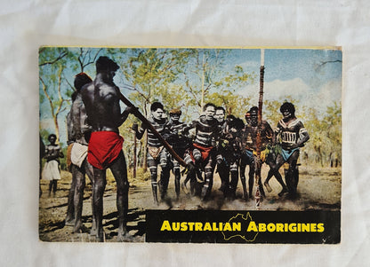 Fourteen Photographs of Australian Aborigines  Taken in Arnhem Land, Northern Territory, Australia  (A Souvenir folder containing 14 photographs of some of Australia’s unique birds and animals taken in the Australian bush)