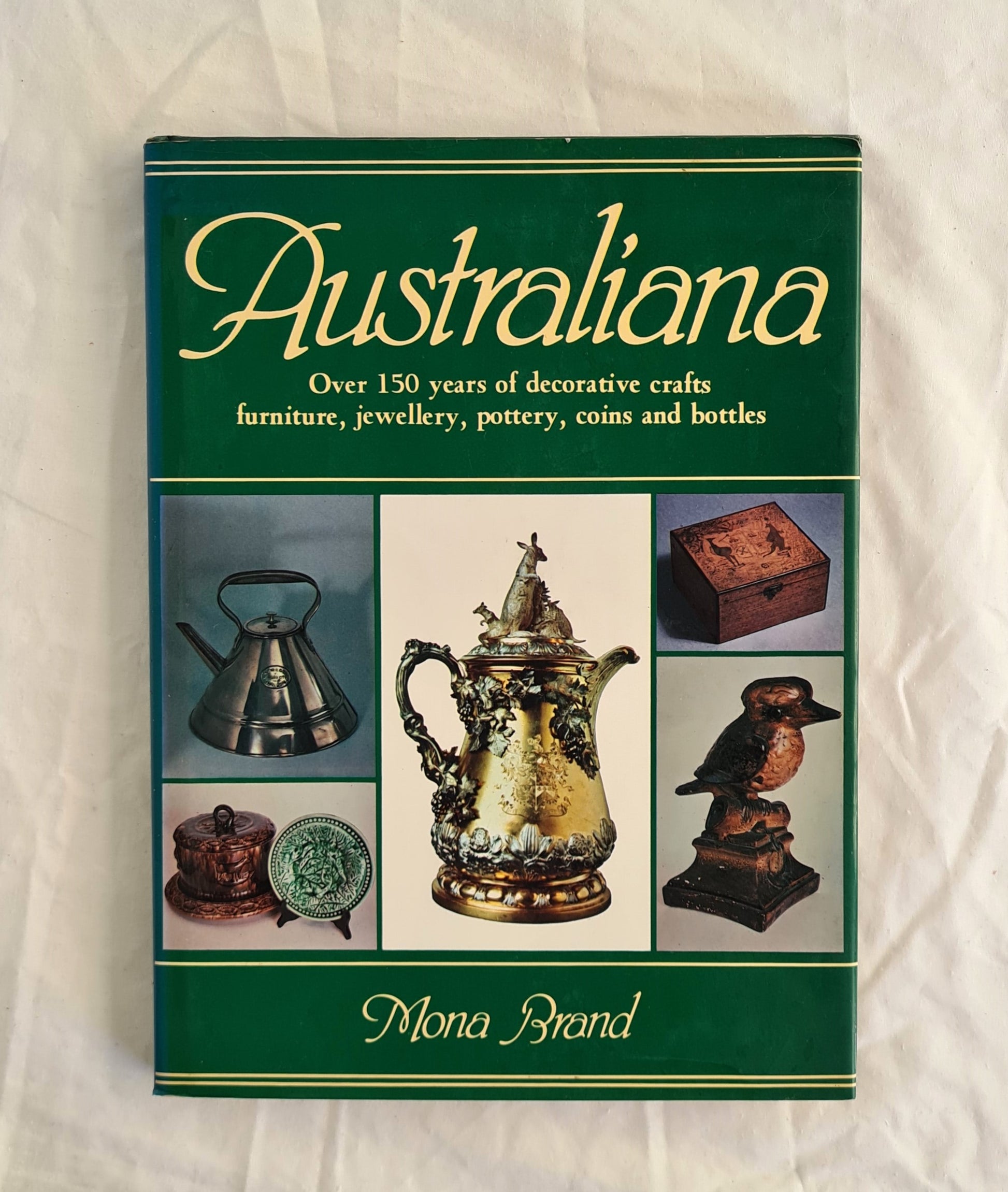 ﻿ Australiana  Over 150 years of decorative crafts furniture, jewellery, pottery, coins and bottles  by Mona Brand  photography by Russell Cockayne