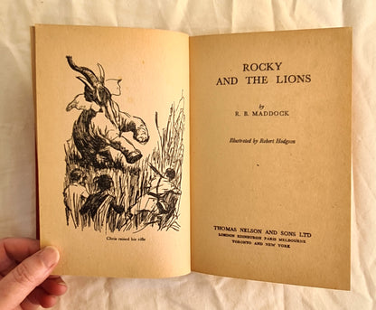 Rocky and the Lions by R. B. Maddock