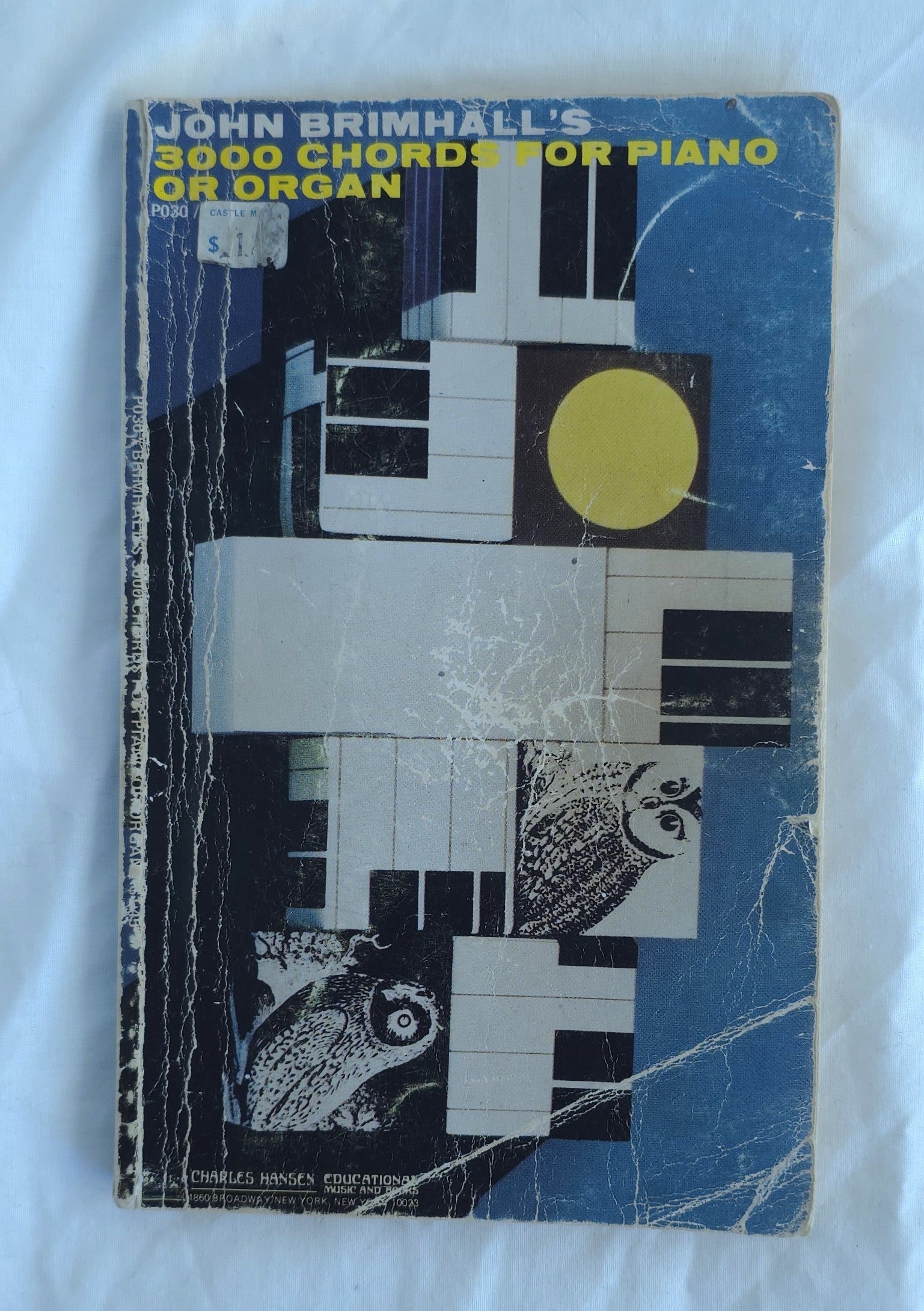 Book cover of '3000 Chords for Piano or Organ' by John Brimhall with geometric design on a white background