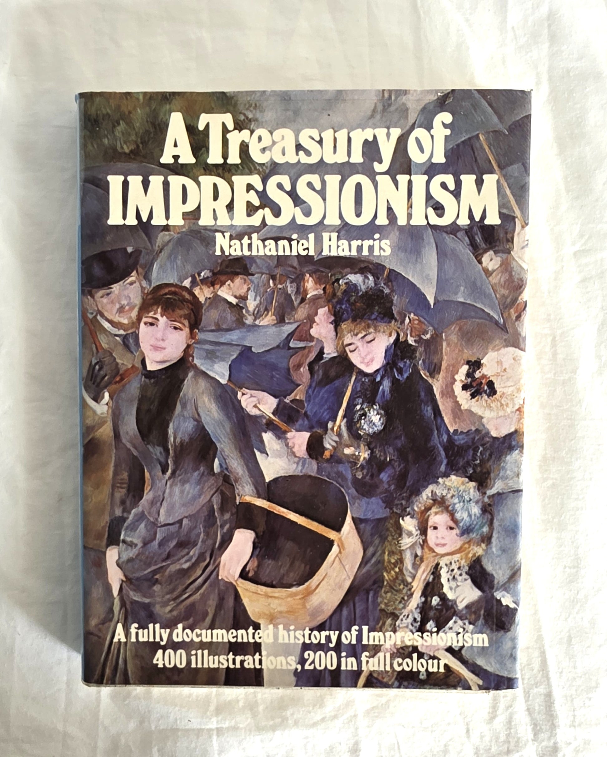 Book cover of 'A Treasury of Impressionism' by Nathaniel Harris on a textured white background