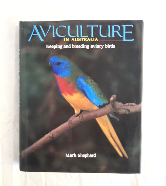 Book titled 'Aviculture in Australia' with a colorful parrot on the cover.