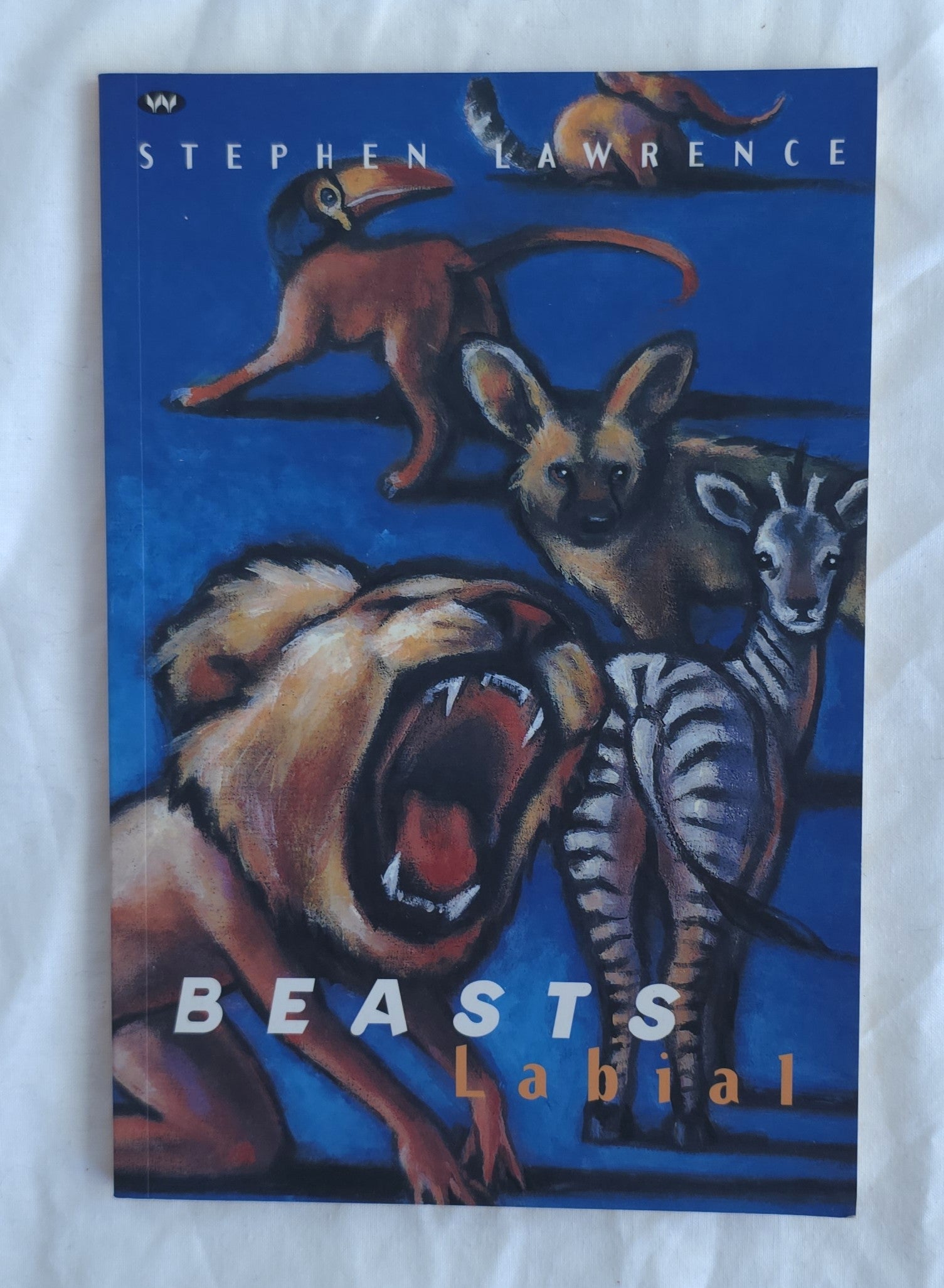 Book cover of 'Beasts Labial' by Stephen Lawrence with illustrations of animals on a blue background.