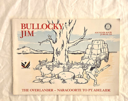 Souvenir book cover titled 'Bullocky Jim' with illustrations of a overlander and landscape on a textured beige background.