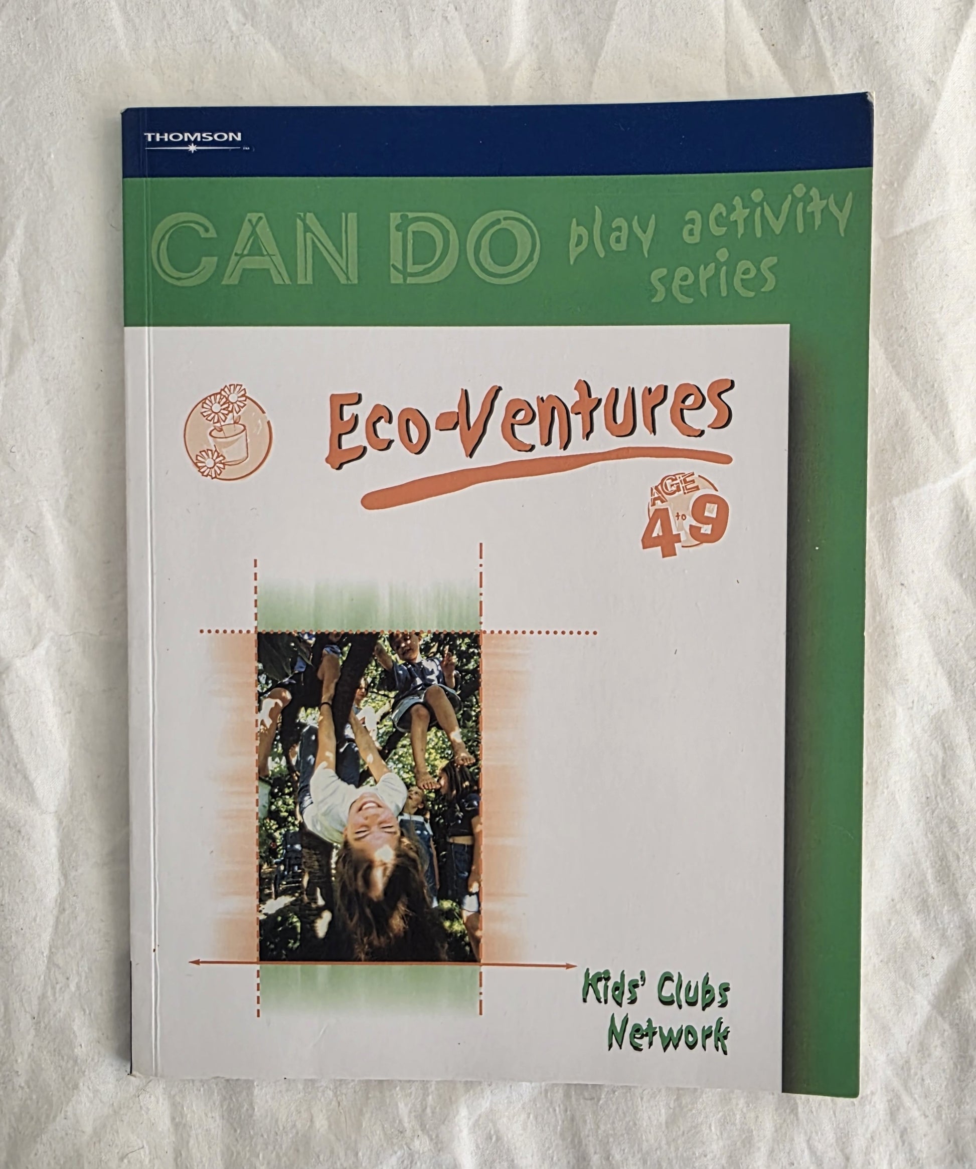 Book titled 'Eco-Ventures' from the 'Can Do Play Activity Series' on a textured white background