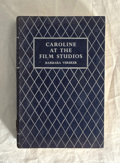 Book titled 'Caroline at the Film Studios' by Barbara Vereker with a blue diamond pattern cover.