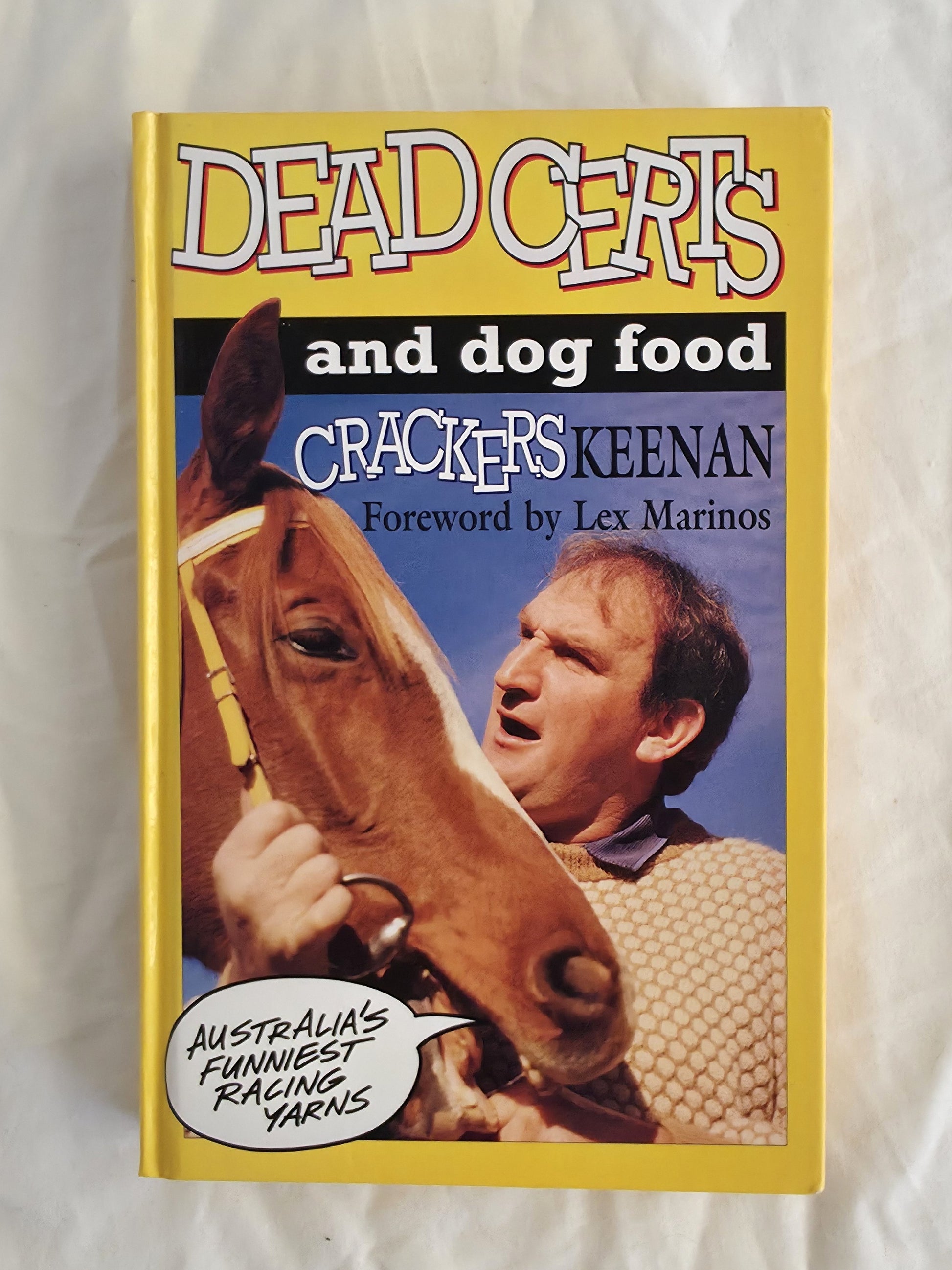 Book cover of 'Dead Certs and Dog Food' with a person and horse illustration on a yellow background.