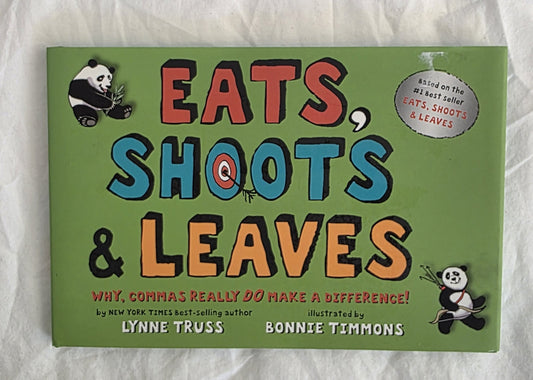 Book cover of 'Eats, Shoots & Leaves' with panda illustrations on a light gray background