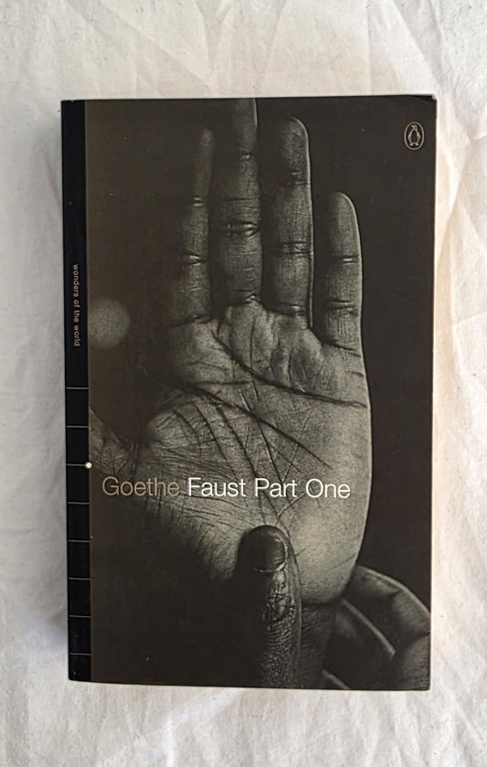 Book cover of 'Faust Part One' by Goethe with a black and white photograph of a hand on a textured white background