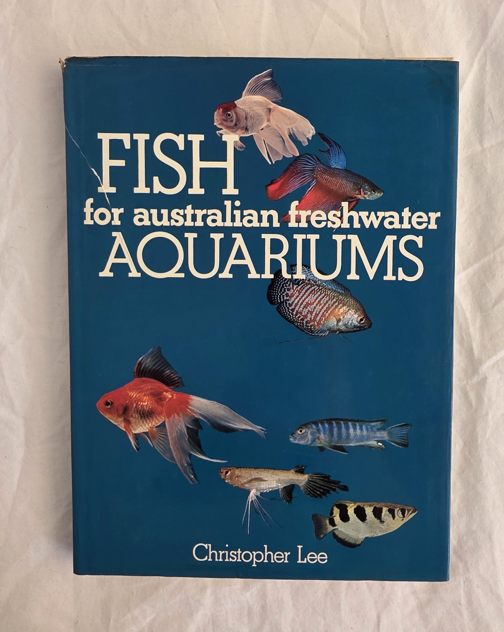 Book titled 'Fish for Australian Freshwater Aquariums' by Christopher Lee on a white background