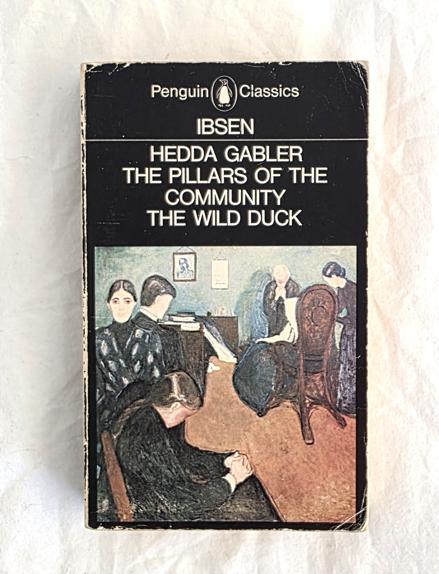 Book cover of 'Hedda Gabler', 'The Pillars of the Community', and 'The Wild Duck' by Ibsen, published by Penguin Classics.