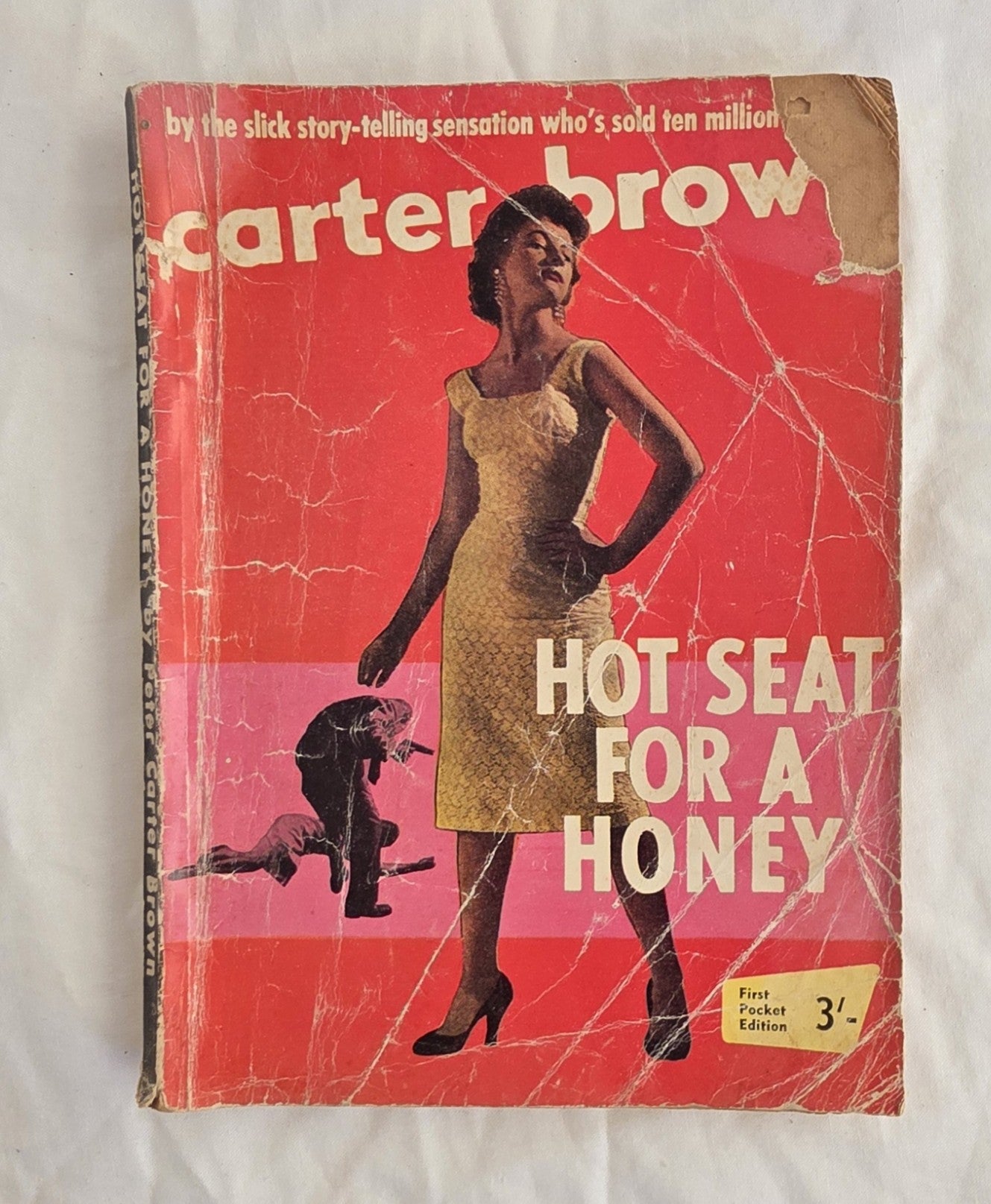 Vintage book cover with a woman in a yellow dress and text 'Hot Seat for a Honey' by Carter Brow.