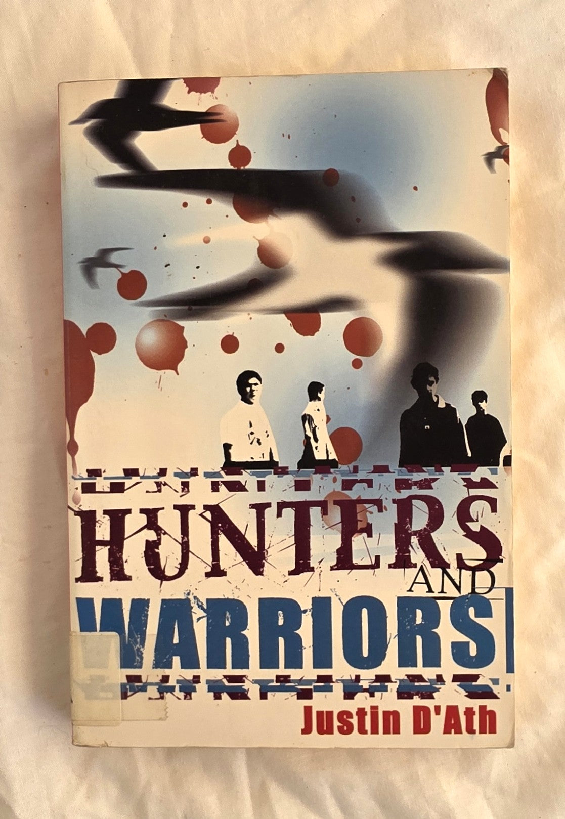 Book cover of 'Hunters and Warriors' by Justin D'Ath with abstract design and silhouettes.