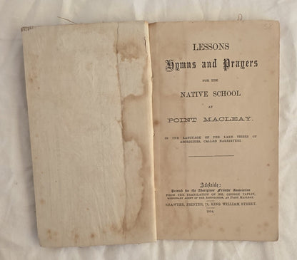Open book with title page on a white background