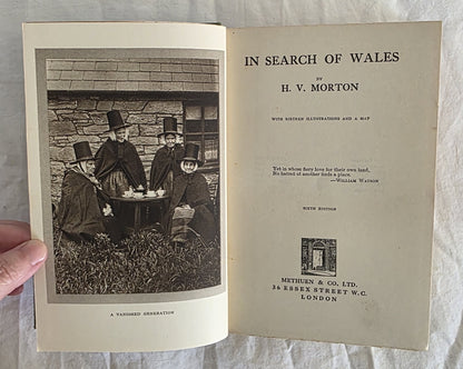 Book titled 'In Search of Wales' by H.V. Morton with a black and white photo on the cover.