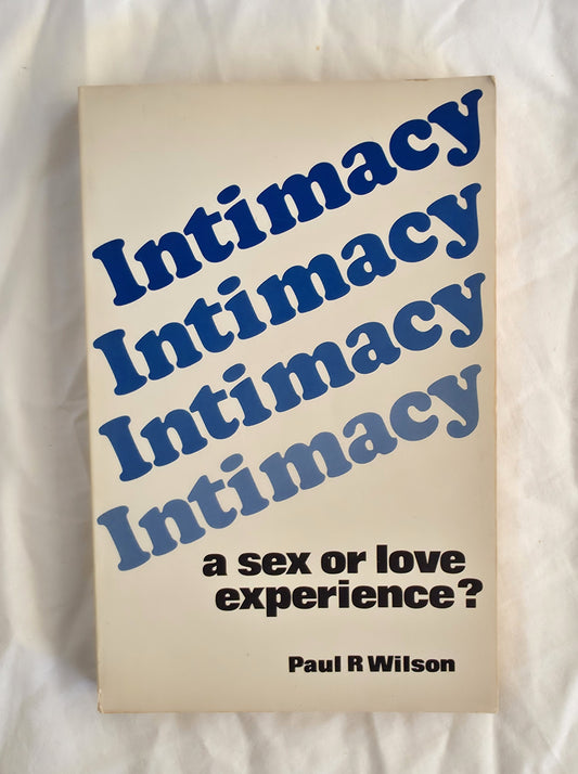 Book titled 'Intimacy: a sex or love experience?' by Paul R Wilson on a white background