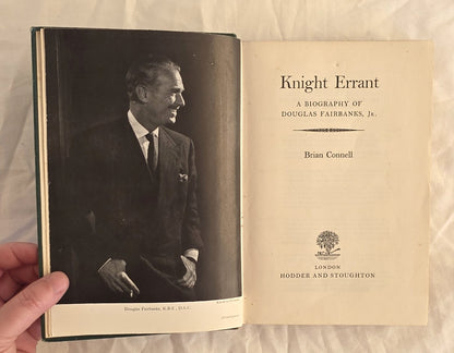 Book titled 'Knight Errant' by Brian Connell held open to show cover and title page.