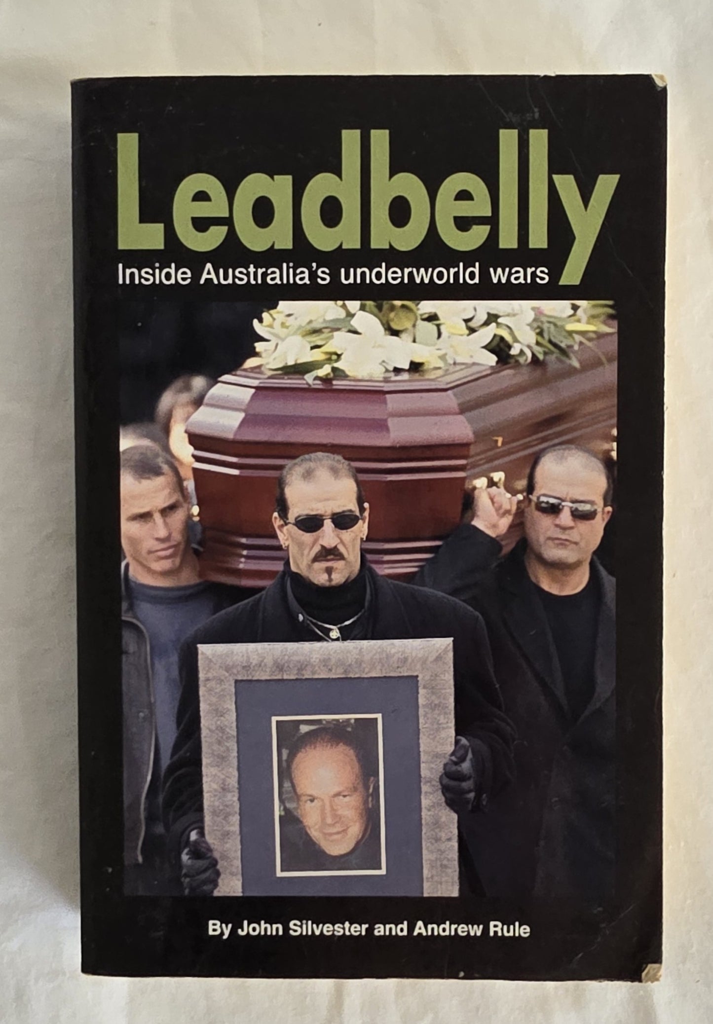 Book cover of 'Leadbelly: Inside Australia's underworld wars' with a black background and text.