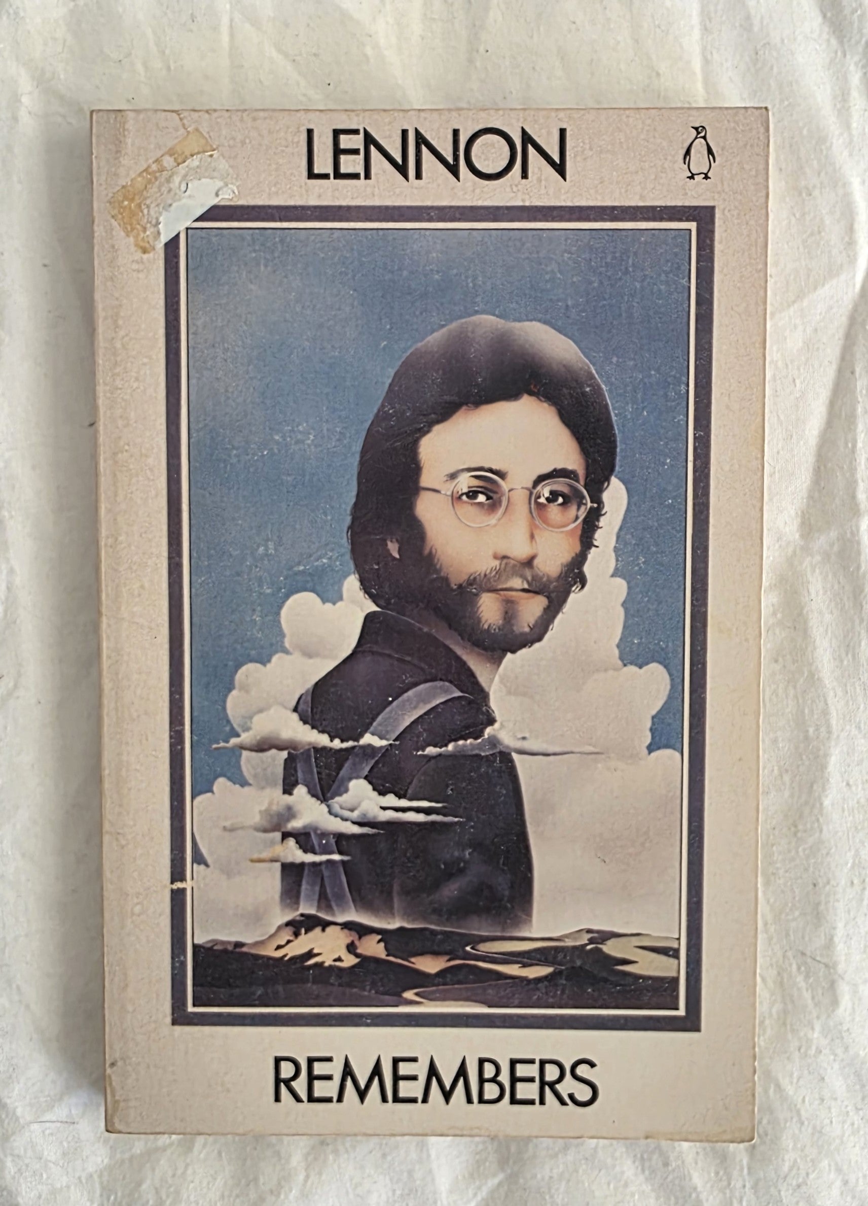 Book cover of 'Lennon Remembers' with a portrait of John Lennon on a textured background
