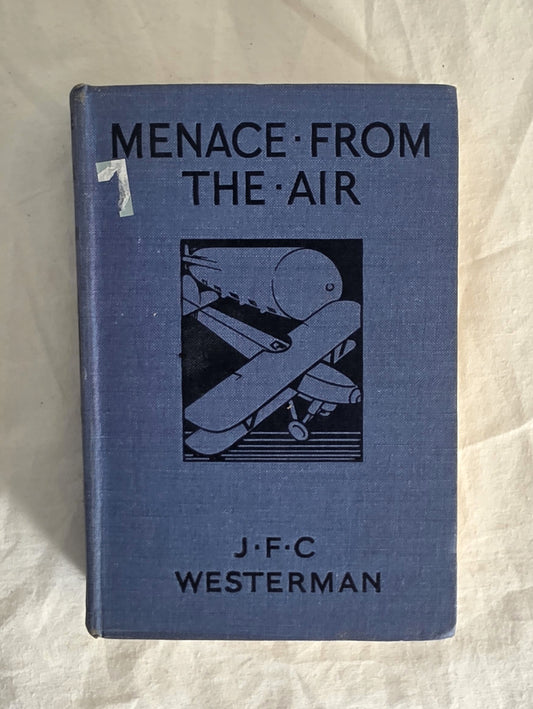 Book titled 'Menace from the Air' by J.F.C. Westerman on a textured beige background