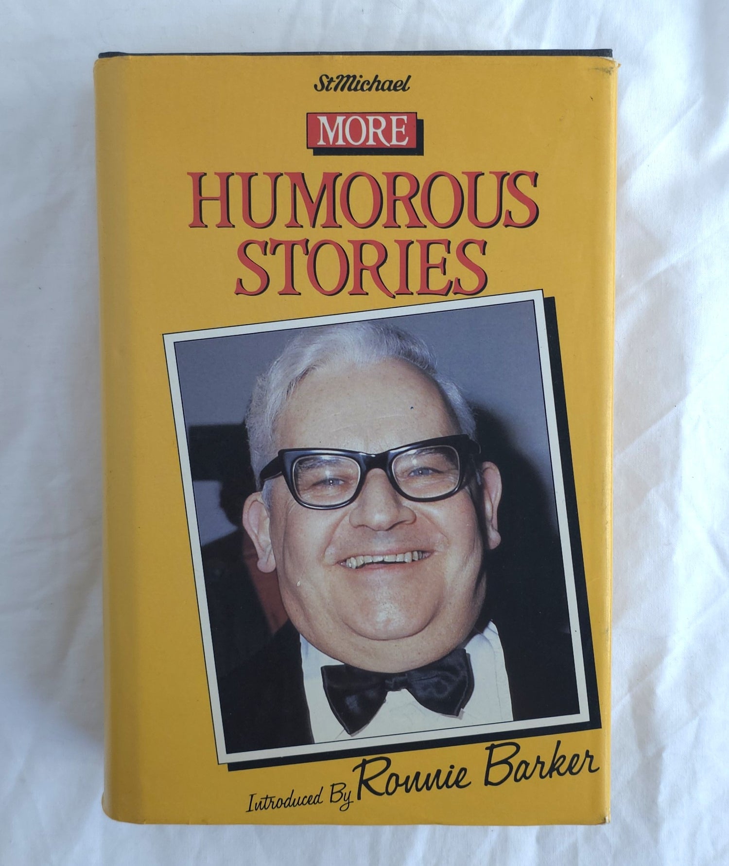 Book titled 'More Humorous Stories' with a portrait of a man on the cover, on a white background.