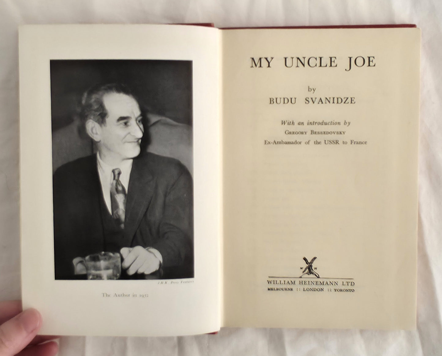 Open book titled 'My Uncle Joe' by Budu Svanidze with a portrait on the left page.