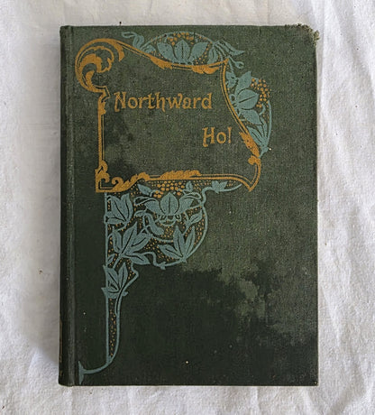 Vintage book titled 'Northward Ho!' with decorative cover on a textured white background