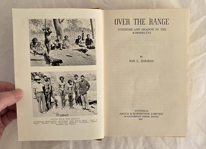 Open book titled 'Over the Range' with black and white photographs on a light background