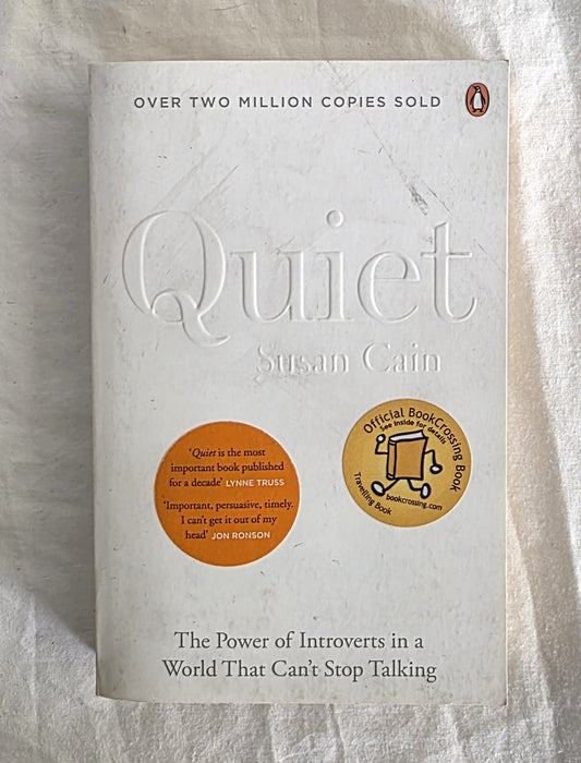 Book titled 'Quiet' by Susan Cain on a textured surface