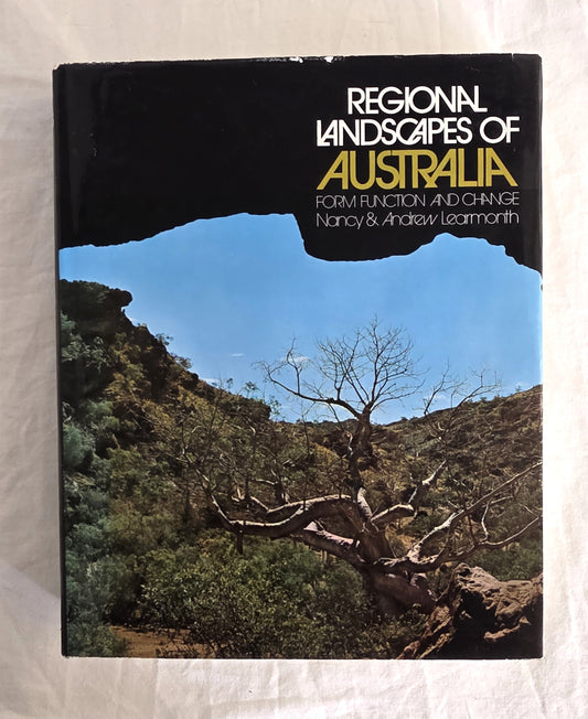 Book cover of 'Regional Landscapes of Australia' with a scenic view of a tree and cliffs.