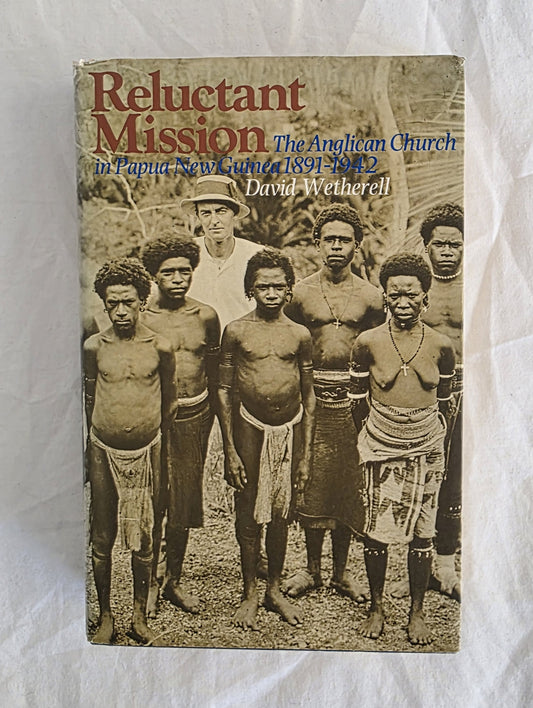 Book cover of 'Reluctant Mission: The Anglican Church in Papua New Guinea 1891-1942' by David Wetherell on a textured white background.