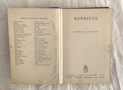 Open book showing the title 'Reprieve' by Warwick Deeping with a list of books on a textured background.