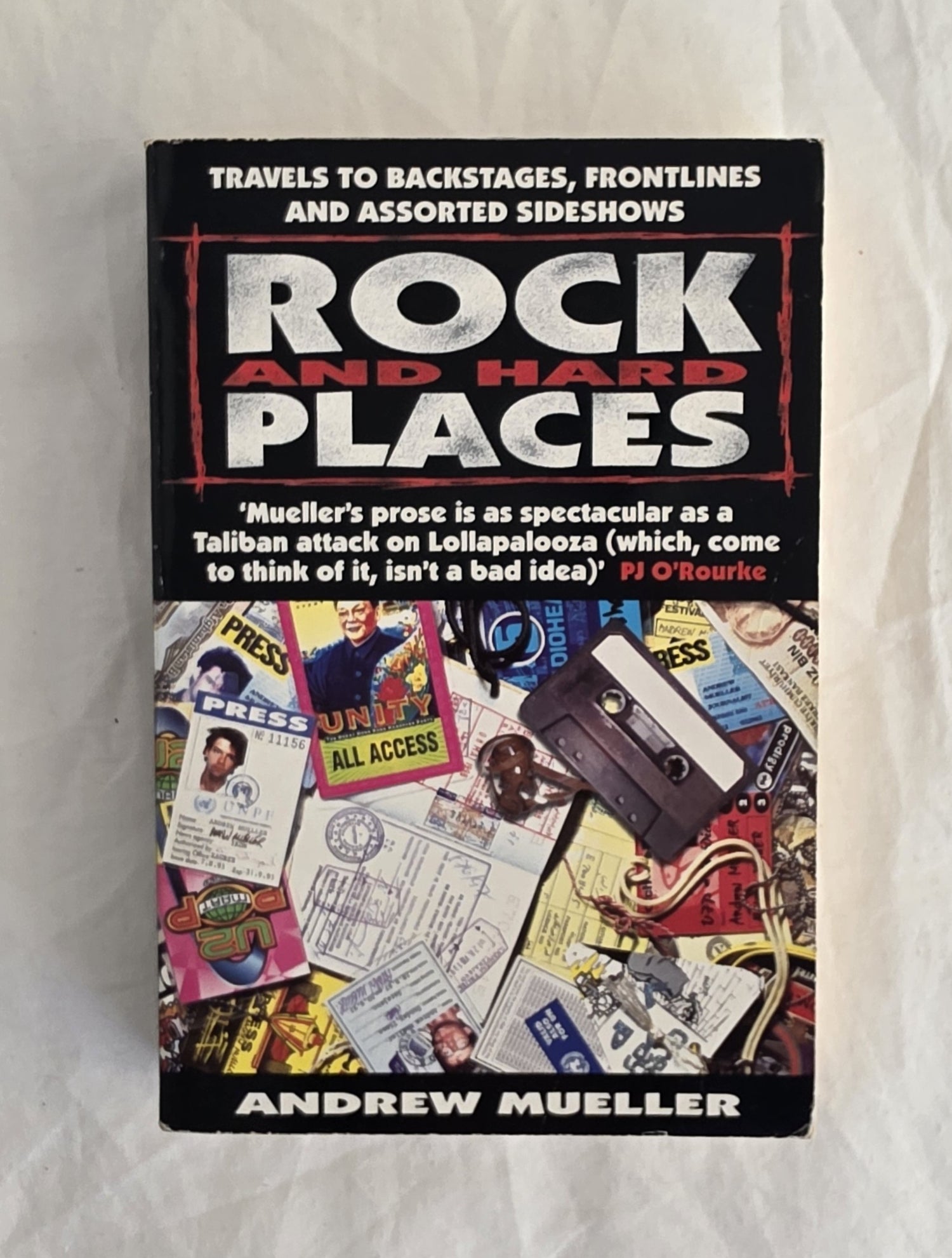 Book titled 'Rock and Hard Places' by Andrew Mueller on a white background