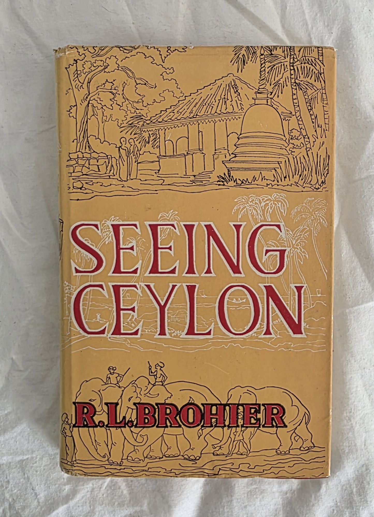 Book cover of 'Seeing Ceylon' by R.L. Brohier with illustrations on a white background