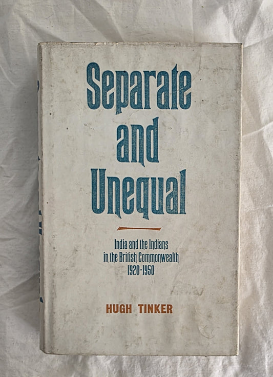 Book titled 'Separate and Unequal' by Hugh Tinker on a textured white background