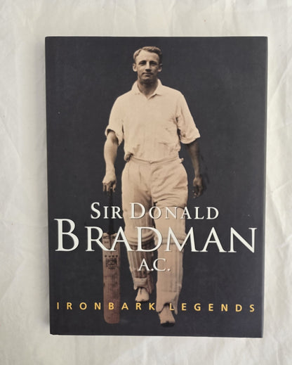 Book cover featuring a black and white photograph of Sir Donald Bradman on a dark background