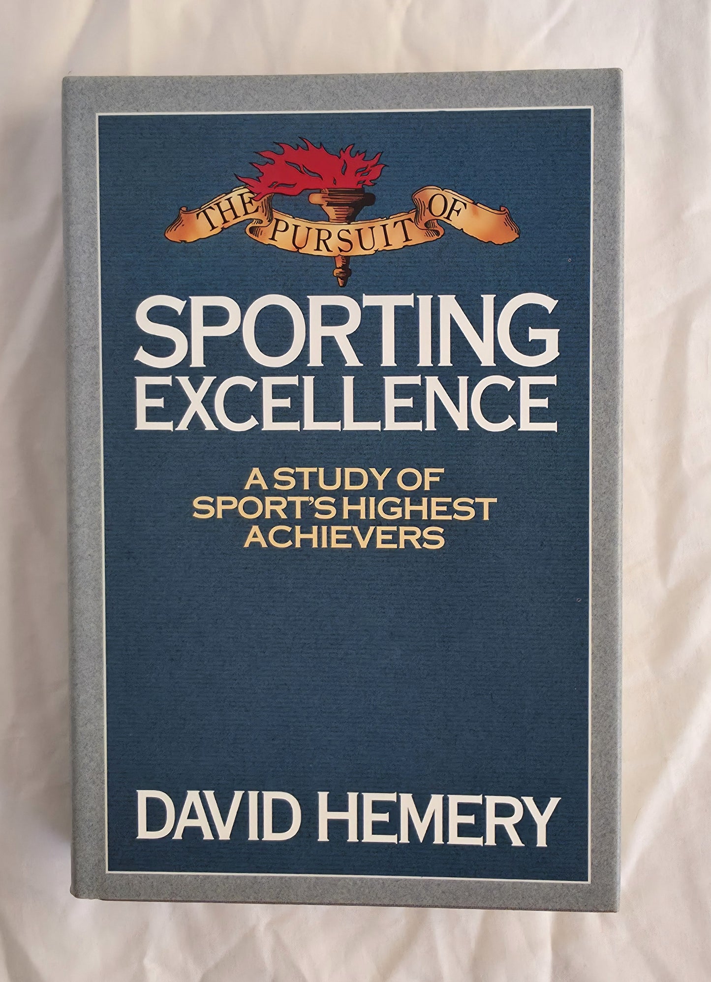 Book cover of 'The Pursuit of Sporting Excellence' by David Hemery on a white background