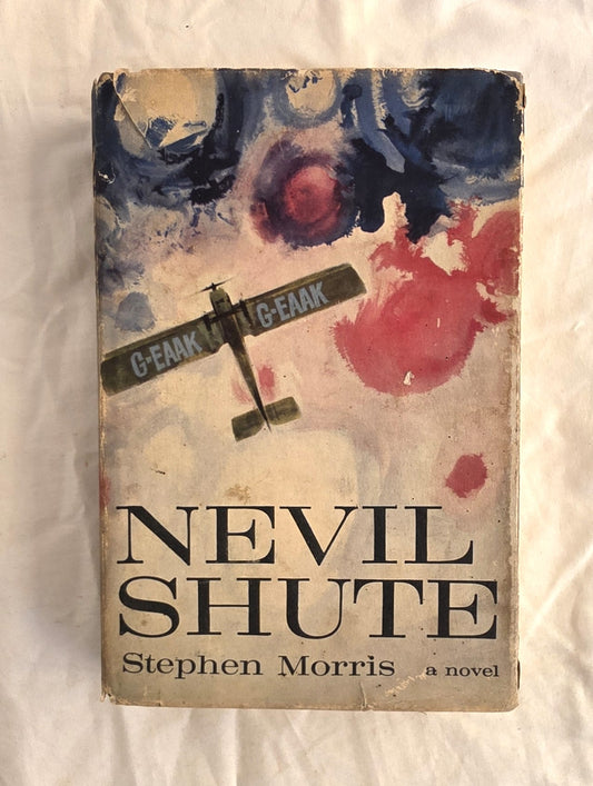 Book cover of 'Nevil Shute' by Stephen Morris with an airplane and abstract design on a textured background