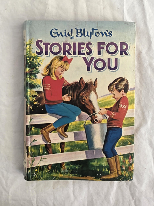 Book titled 'Stories for You' by Enid Blyton with a cover illustration of two children and a horse on a white background.