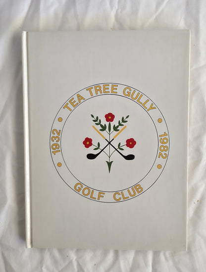 Notebook with 'Tea Tree Gully Golf Club' design on a white background