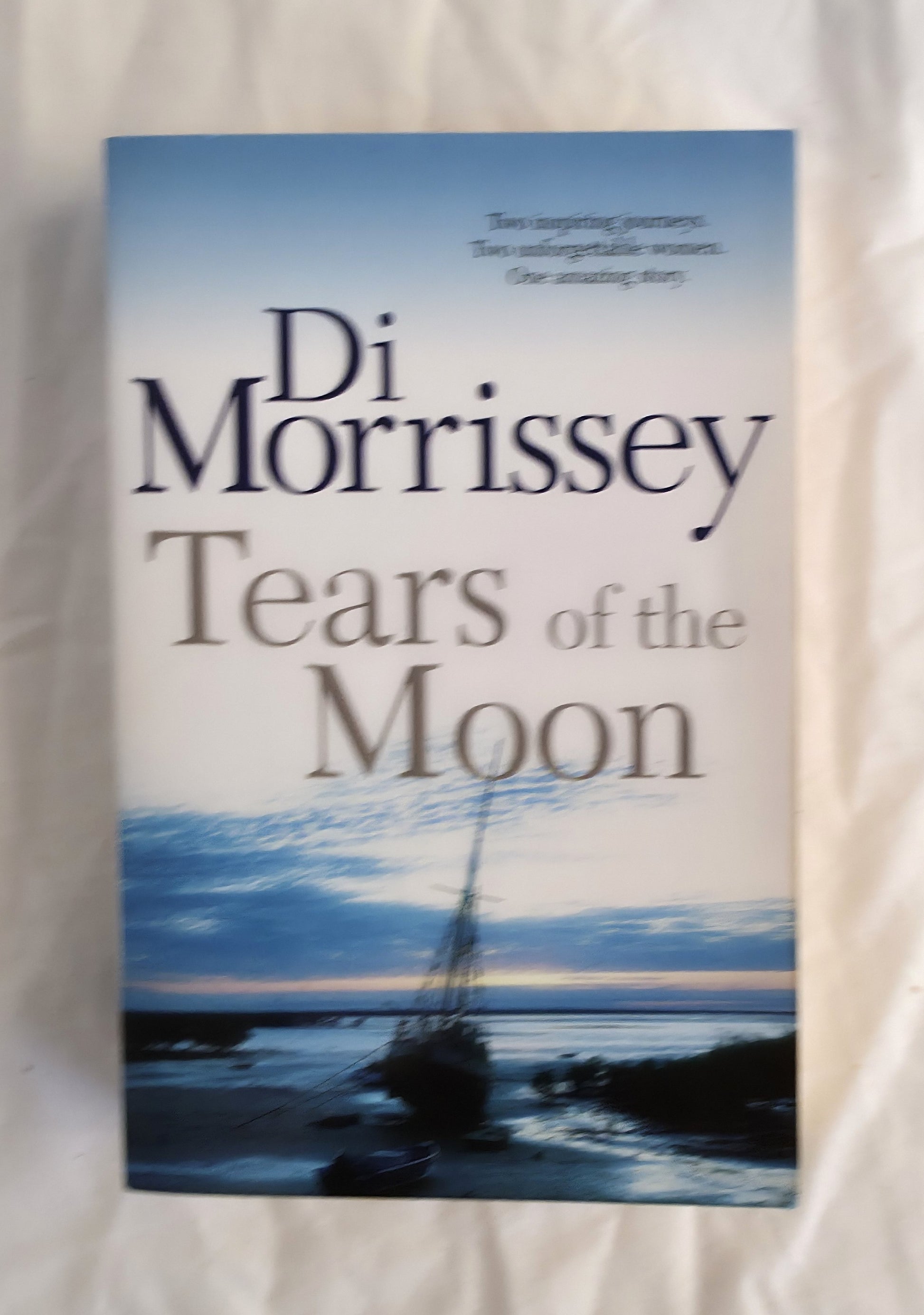 Book cover of 'Tears of the Moon' by Di Morrissey on a white background