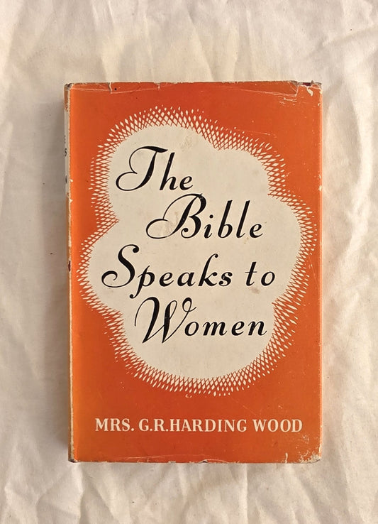 Book titled 'The Bible Speaks to Women' by Mrs. G.R. Harding Wood on a textured white background