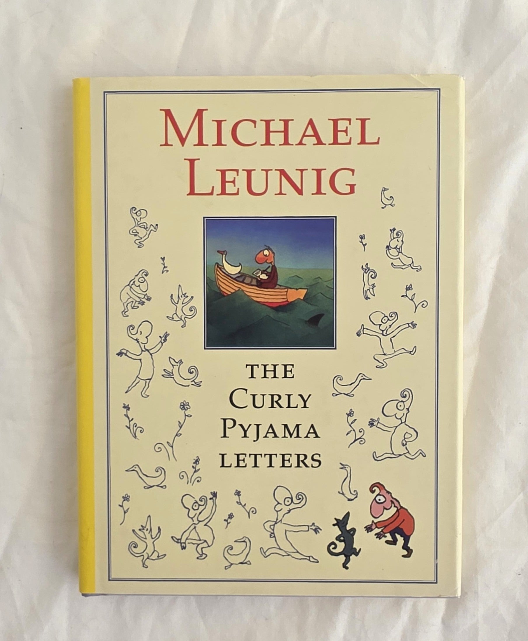 Book cover of 'The Curly Pyjama Letters' by Michael Leunig on a textured white background