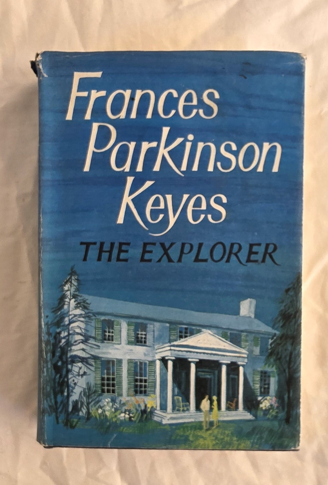 Book cover of 'The Explorer' by Frances Parkinson Keyes with a blue background and illustration of a house.