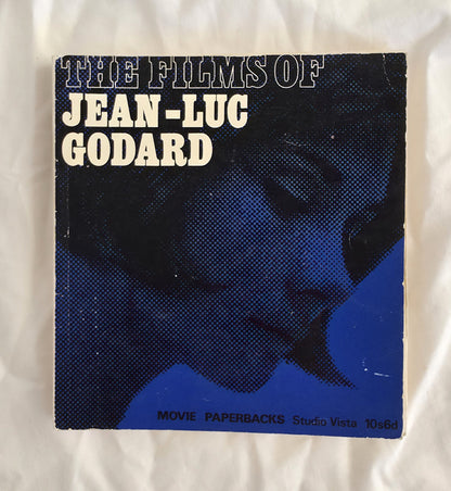 Book cover of 'The Films of Jean-Luc Godard' with a blue and black design on a textured white background.