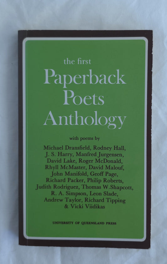 Book cover of 'The First Paperback Poets Anthology' with a green background and brown border.